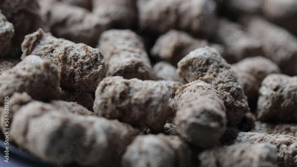 natural bran close-up rotates in a circle. side view natural bran close-up rotates in a circle. side view