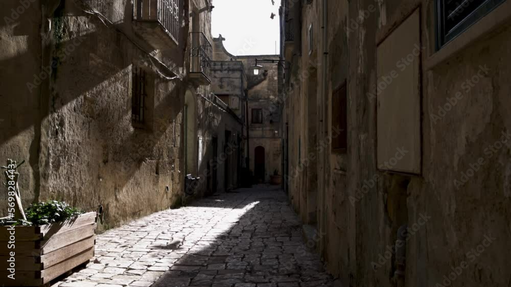 Matera, Italy Alley with sun beam Matera, Italy Alley with sun beam