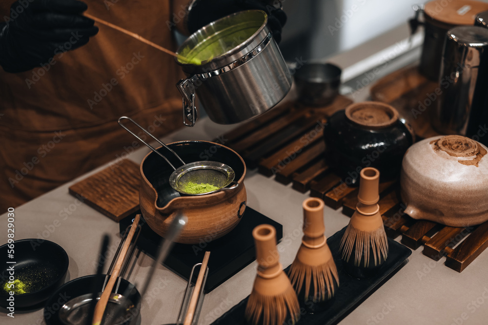 Japanese Matcha green tea making process. Traditional utensils made from natural organic materials Japanese Matcha green tea making process. Traditional utensils made from natural organic materials