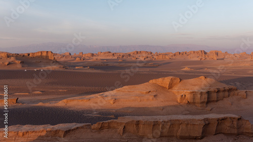 Serene sunset over the amazing Dasht-e Lut Desert and its rock formations (Kaluts) at sunset, Kerman Province, Iran