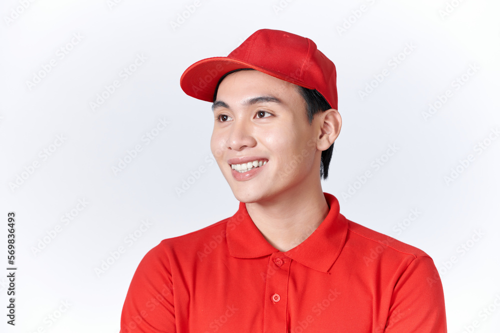 Young handsome delivery man wearing cap standing over isolated red background with serious expression on face Young handsome delivery man wearing cap standing over isolated red background with serious expression on face