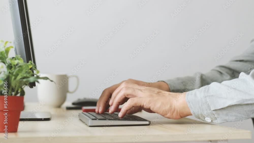 view side business people hands typing on keyboard computer desktop view side business people hands typing on keyboard computer desktop