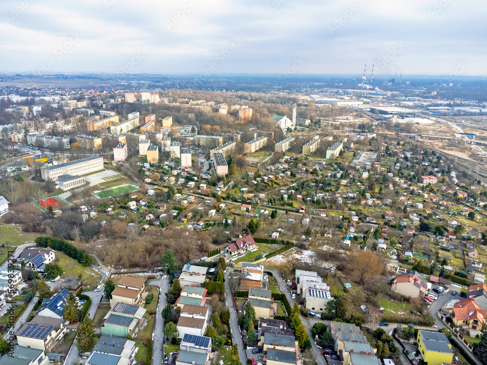 Aerial view landscape. Buildings, houses, bungalow estate, roofs and streets.