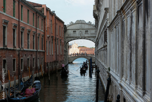 Venezia. Rio di Palazzo con Ponte dei Sospiri e gondola vro san Giorgio. photo