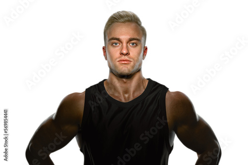 Portrait of a handsome confident muscular young man