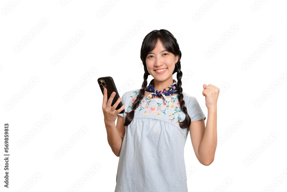Portrait of happy beautiful young asian woman in denim dress using a smartphone on white background. studio shot Portrait of happy beautiful young asian woman in denim dress using a smartphone on white background. studio shot
