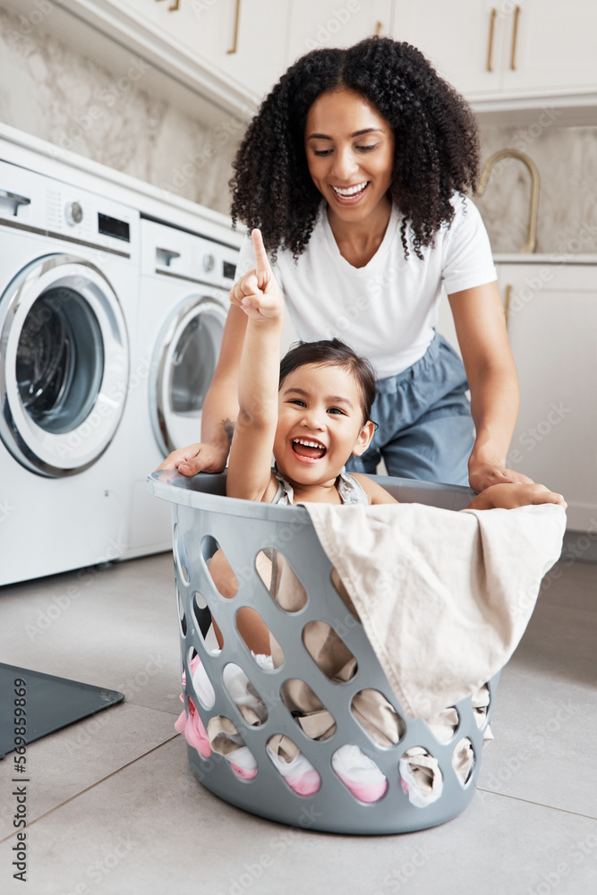 Mom, laundry and girl kid in basket by washing machine for cleaning