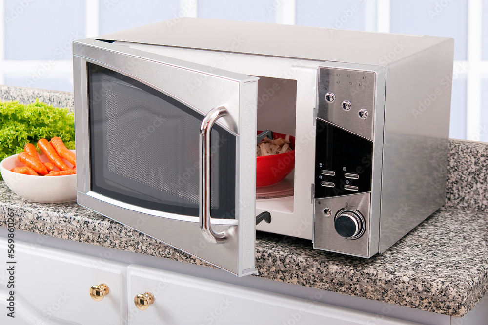 Fototapeta premium Microwave oven; photo in kitchen environment.