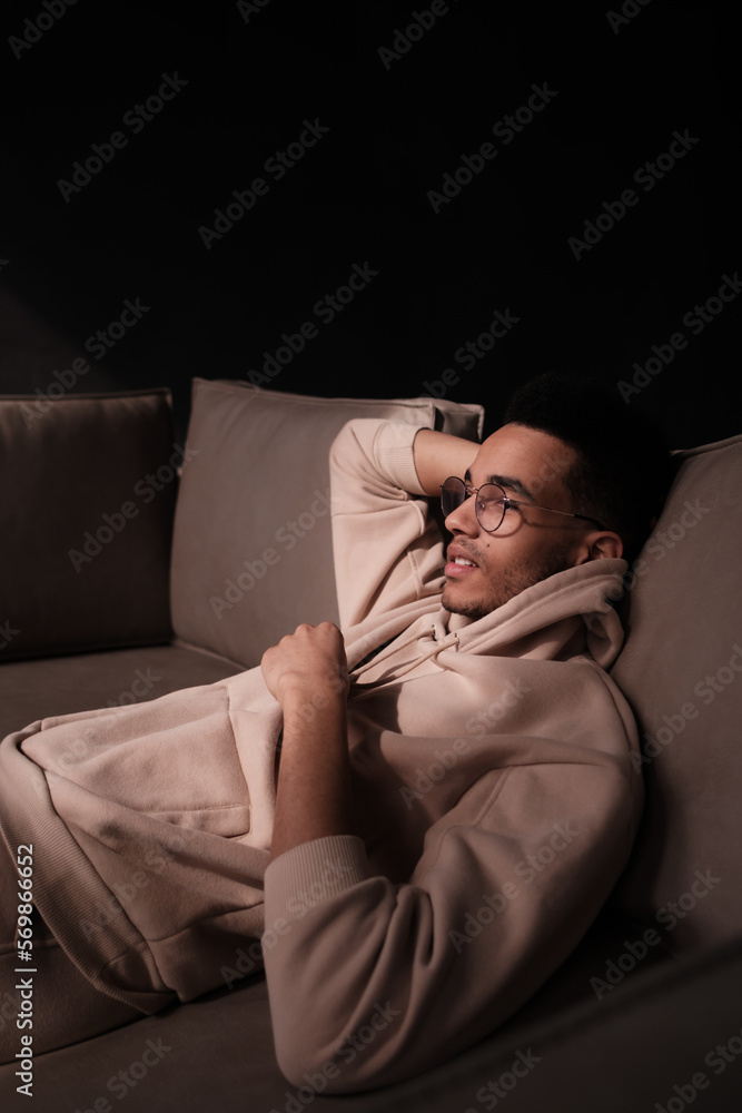 Handsome african american man wearing casual clothes and glasses happy face smiling looking at the camera. positive person. Handsome african american man wearing casual clothes and glasses happy face smiling looking at the camera. positive person.