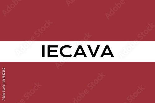 Iecava: Illustration mit dem Ortsnamen der lettischen Stadt Iecava auf der Flagge von Lettland photo