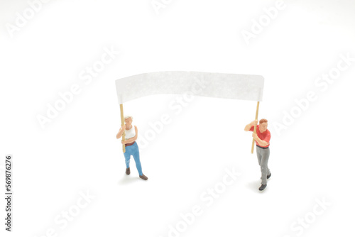 a mini figure hold the empty blank board