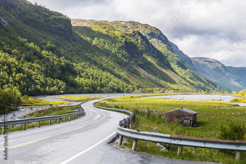 Epic scenic road Hunnedalsvegen through an idyllic valley in Norway © Photofex