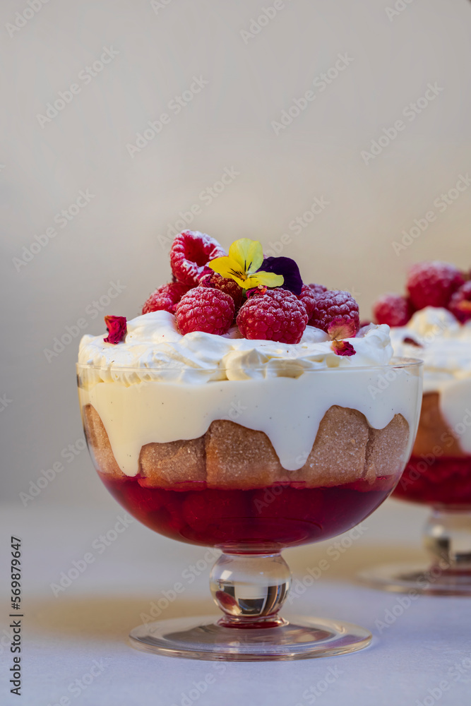 Raspberry trifle with fruit jelly, custard and cream Raspberry trifle with fruit jelly, custard and cream