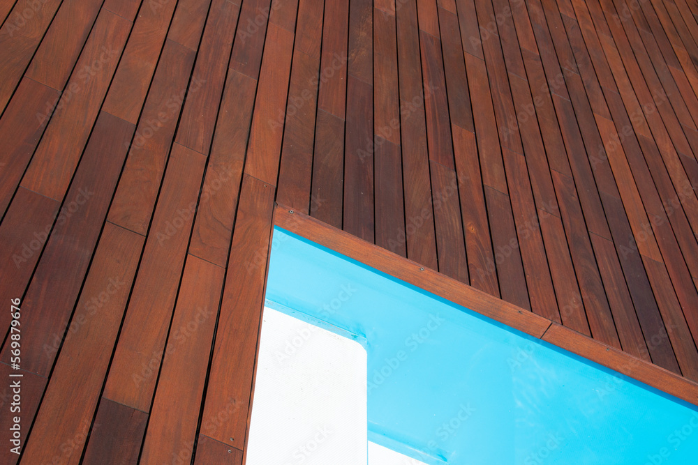 Swimming pool edge and ipe decking, inground pool steps access into