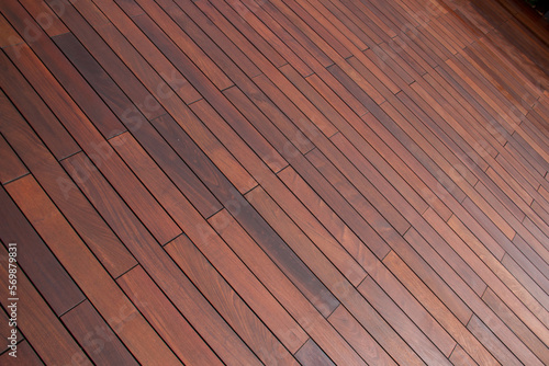 Brown wooden texture for background, exterior terrace of exotic wood ipe planks. photo