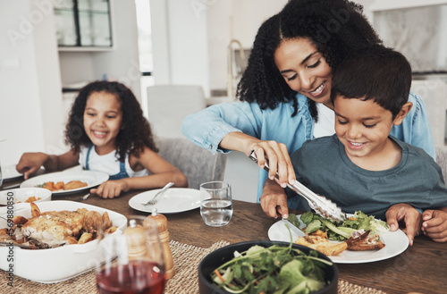 Fotobehang Mom, children and eating food in home together for lunch, dinner table and healthy meal