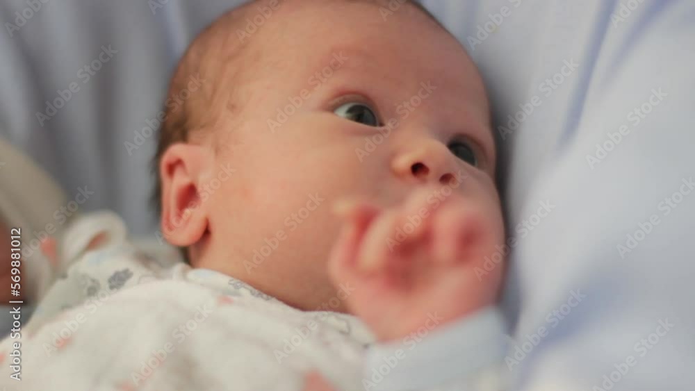 Cute Little Baby Girl, Close Up of Newborn Child in Cradle Cute Little Baby Girl, Close Up of Newborn Child in Cradle