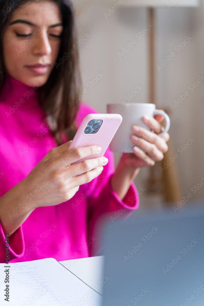 woman using smartphone at home woman using smartphone at home