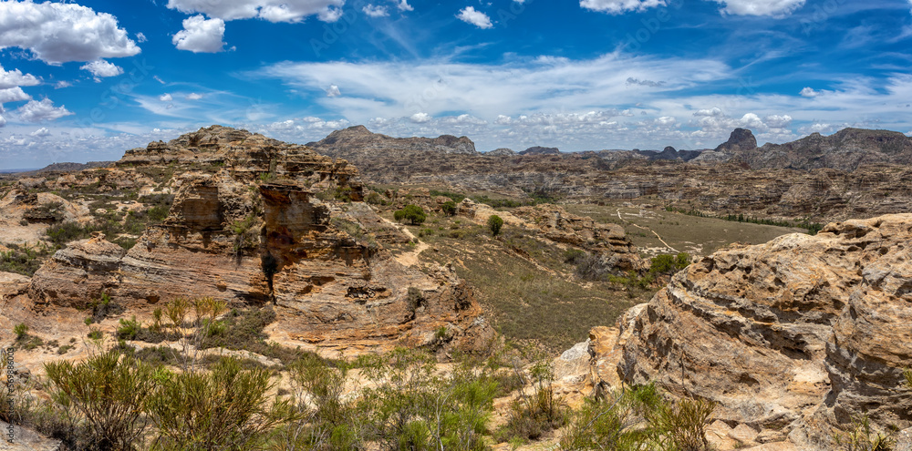 Isalo National Park in Ihorombe Region. Wilderness landscape with water erosion into rocky outcrops, plateaus, extensive plains and deep canyons like in Utah. Beautiful Madagascar panorama landscape. Isalo National Park in Ihorombe Region. Wilderness landscape with water erosion into rocky outcrops, plateaus, extensive plains and deep canyons like in Utah. Beautiful Madagascar panorama landscape.