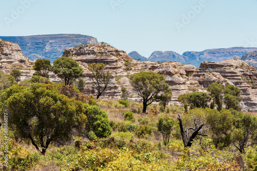 Isalo National Park in Ihorombe Region. Wilderness landscape with water erosion into rocky outcrops, plateaus, extensive plains and deep canyons like in Utah. Beautiful Madagascar panorama landscape. photo