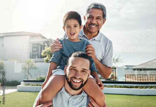 Portrait of happy family child, father and grandfather bonding, smile or enjoy quality time together in front yard. House lawn, vacation love and outdoor people on holiday in Rio de Janeiro Brazil © Allistair F/peopleimages.com
