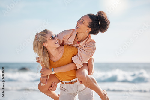 Piggyback, happy or friends at a beach to relax talking or laughing on summer holiday vacation in Florida, USA. Bonding, smile or women enjoy traveling to sea or ocean on girls trips with freedom