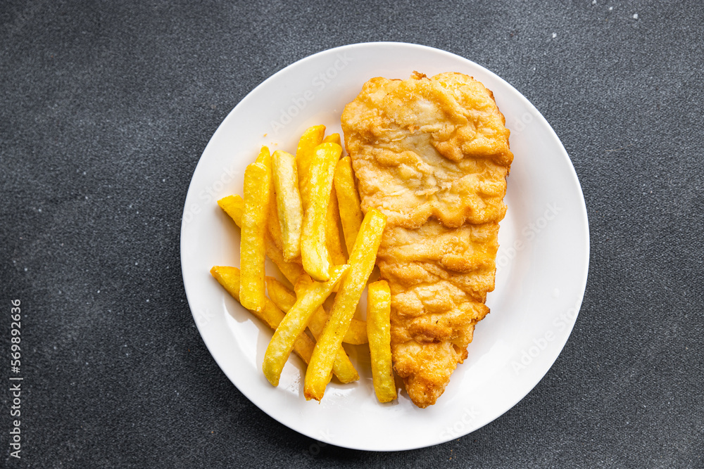 fish and chips french fries deep fried fast food takeaway healthy meal food snack on the table copy space food background rustic top view fish and chips french fries deep fried fast food takeaway healthy meal food snack on the table copy space food background rustic top view