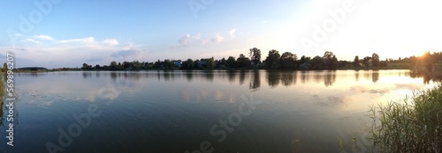 Sunset over lake in Lithuanian village