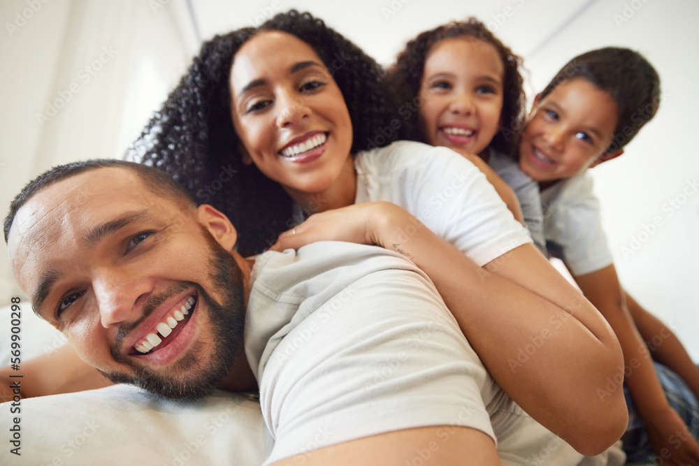 Happy family, portrait and selfie with children and parents relax, play and having fun in their home together. Face, smile and African kids laugh with mother and father for photo while bonding Happy family, portrait and selfie with children and parents relax, play and having fun in their home together. Face, smile and African kids laugh with mother and father for photo while bonding