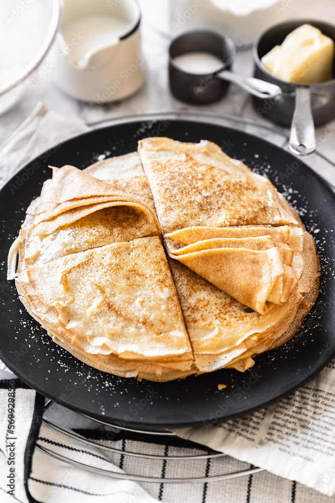 pancakes with butter on a white background with ingredients flour sugar butter pancakes with butter on a white background with ingredients flour sugar butter