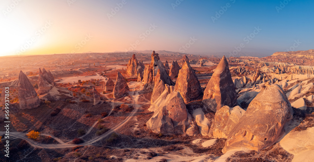 Panorama landscape Cappadocia stone and old cave house in Goreme national park Turkey sunlight, Aerial top view travel