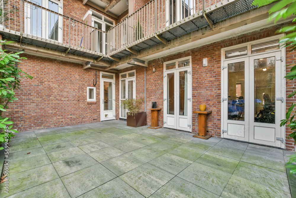 Backyard of brick residential apartment building Backyard of brick residential apartment building
