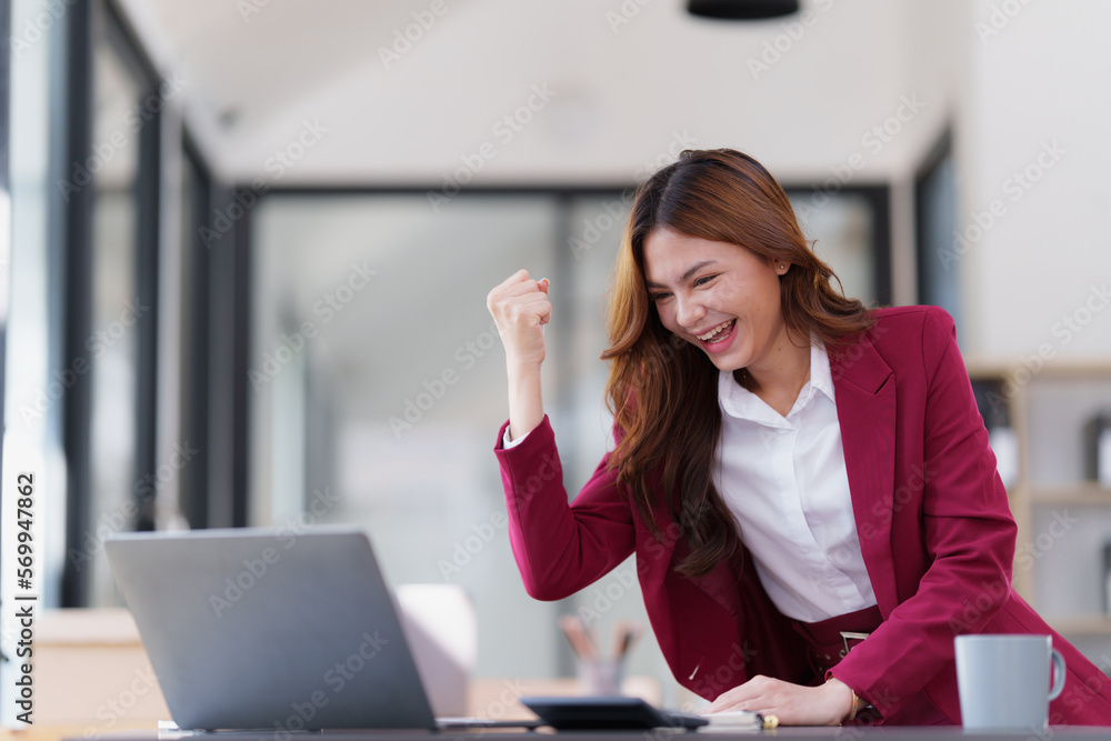 Beautiful Asian Business woman working at home office and analyze financial report document. Accounting and Finance concept. Beautiful Asian Business woman working at home office and analyze financial report document. Accounting and Finance concept.