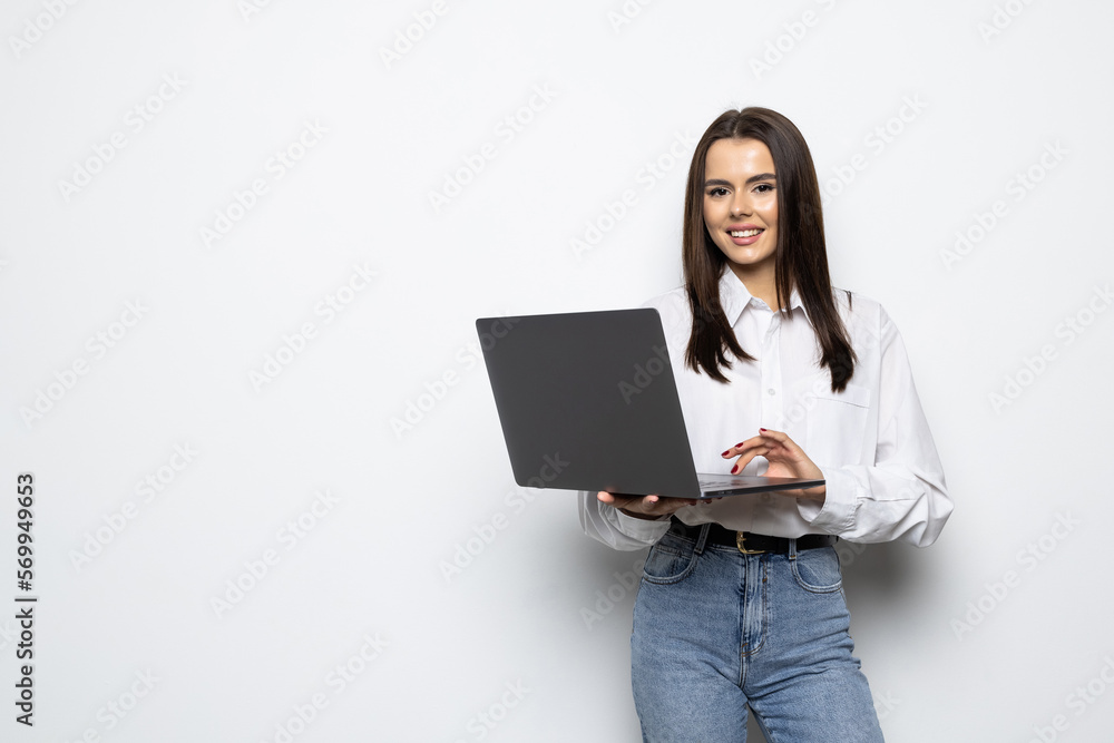Portrait of young woman with laptop on white background Portrait of young woman with laptop on white background
