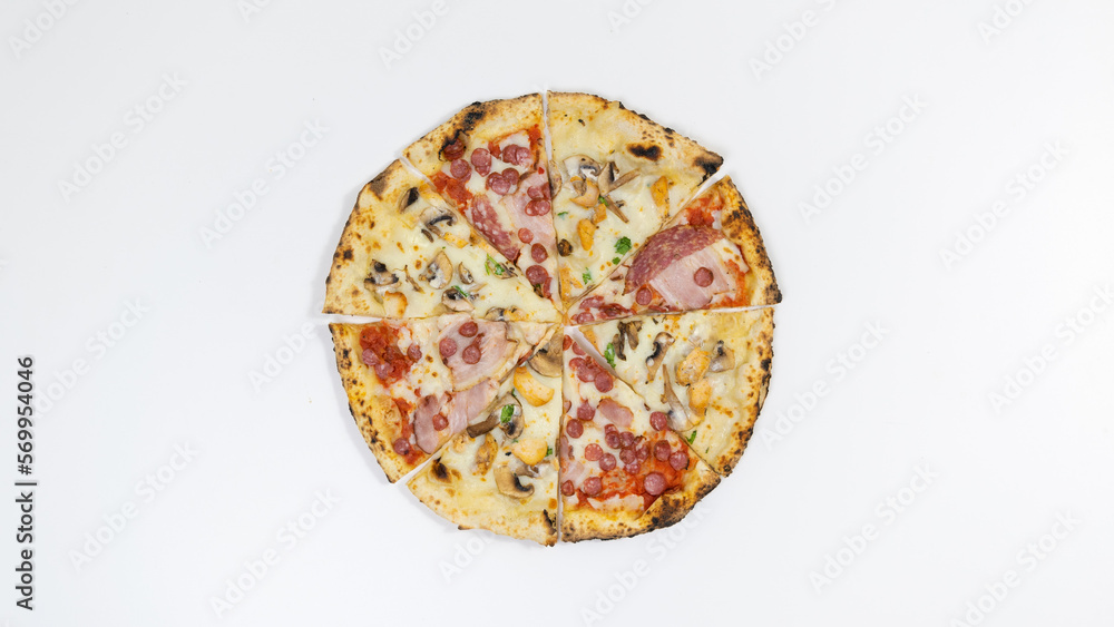 Pieces of pizza lie on a white plate. White background. Pieces of pizza lie on a white plate. White background.