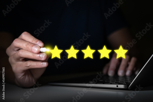 businessman online platform rating 5 or five star for customer feedback satisfaction for good and excellent luxury service of business with technology and digital background