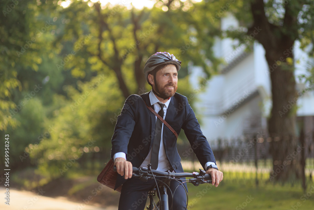 Successful male executive in suit commuting to work at daytime. Successful male executive in suit commuting to work at daytime.