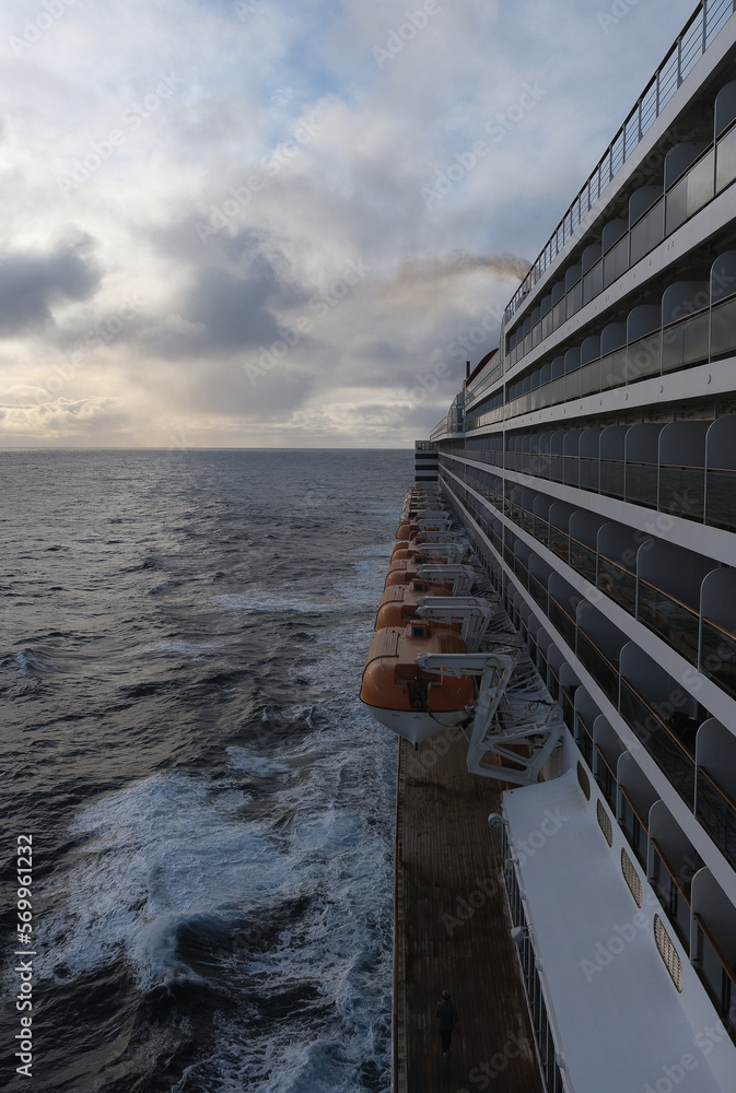 Obraz premium View from deck over bow and side of legendary luxury ocean liner cruise ship on passage during Transatlantic Crossing from Southampton to New York