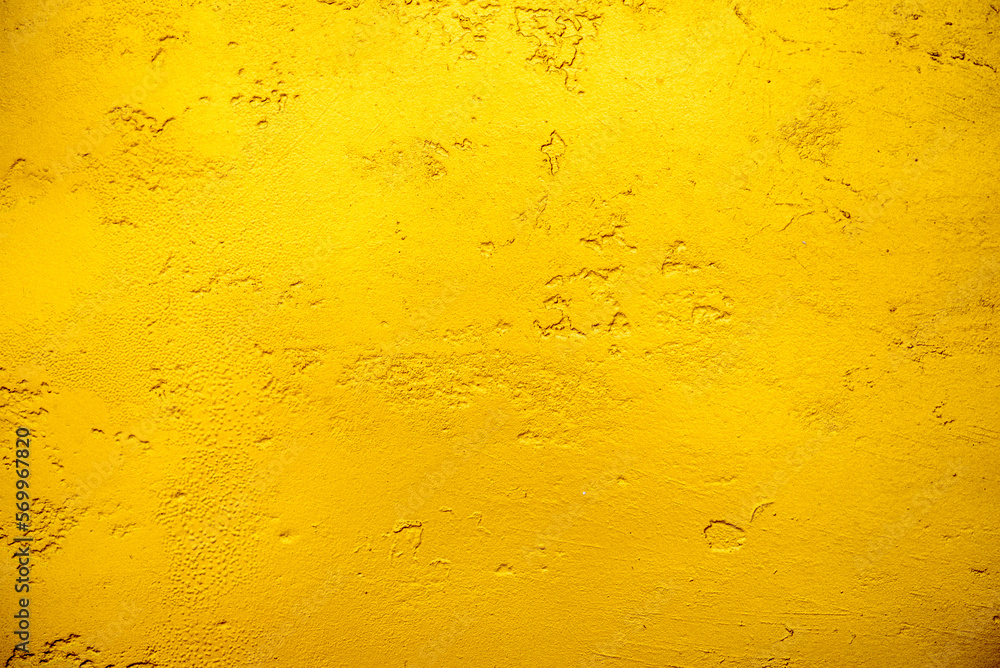 Artificial Gold background and texture on cement make from color paint for look like real gold. Gold foil leaf dirty abstract background texture distress scratch and gradients shadow in Gold glitter Artificial Gold background and texture on cement make from color paint for look like real gold. Gold foil leaf dirty abstract background texture distress scratch and gradients shadow in Gold glitter