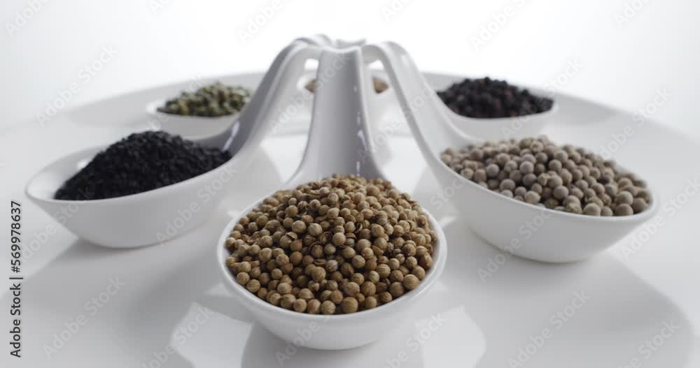 Noble herbs and spices on a spoon For cooking on white background. Asian food.
Noble herbs and spices on a spoon For cooking on white background. Asian food.