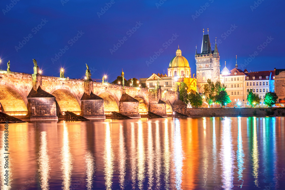 charming evening city landscape over the Vltava river in the old city of Prague, Czech Republic