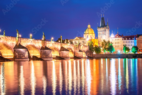 Obraz na płótnie charming evening city landscape over the Vltava river in the old city of Prague, Czech Republic w salonie