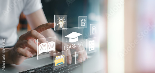Concept of Online education. man use Online education training and e-learning webinar on internet for personal development and professional qualifications. Digital courses to develop new skills. photo