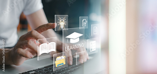 Concept of Online education. man use Online education training and e-learning webinar on internet for personal development and professional qualifications. Digital courses to develop new skills.