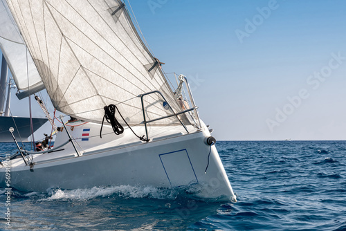 Close-up of a sailing yacht during regatta race photo