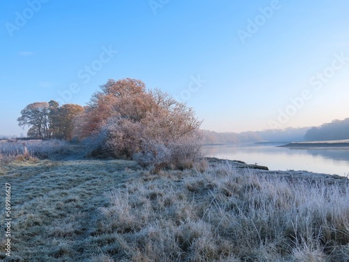 view of the River Hamble Hampshire on a bright cold frosty Winter day © Penny