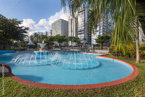 City of Santos, Brasil. Frog Fountain, beach gardens and waterfront buildings. Long exposition photography.