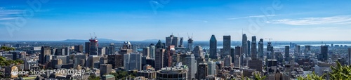 Montreal panorama cityscape view from the Mont Royal Park in a summer sunny day.