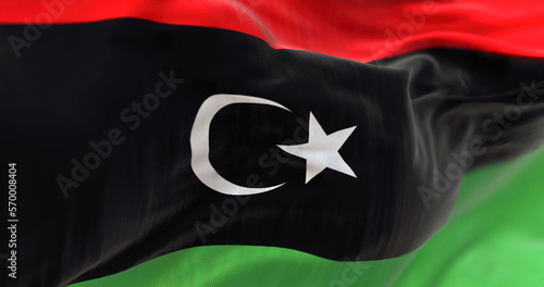 Detail of the Libya national flag fluttering photo