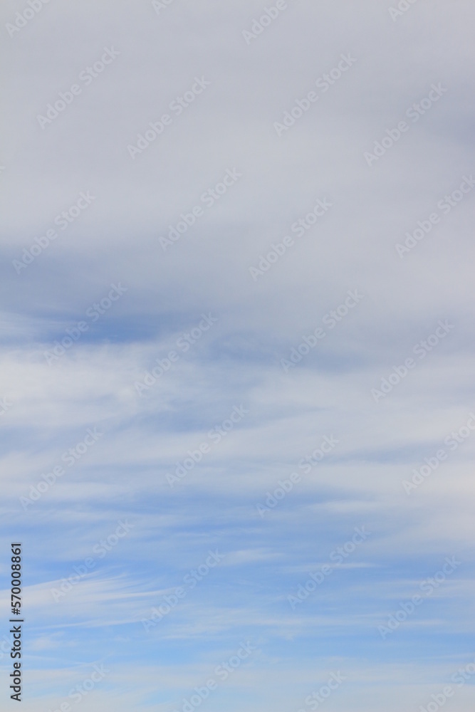 Blue sky and white clouds. Background. Layer. Texture. Selective focus. Out of focus. Copy space